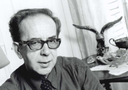 A black and white photograph of Ismail Kadare