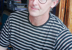 Bruno Montané Krebs wearing a striped shirt.