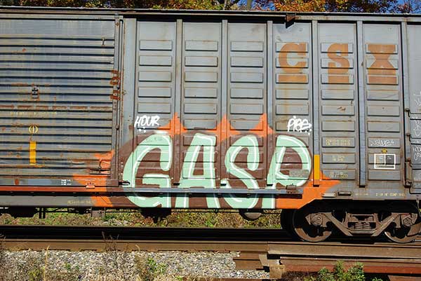 Gasp graffiti on side of a rail car. Photo by Cranky Messiah/Flickr