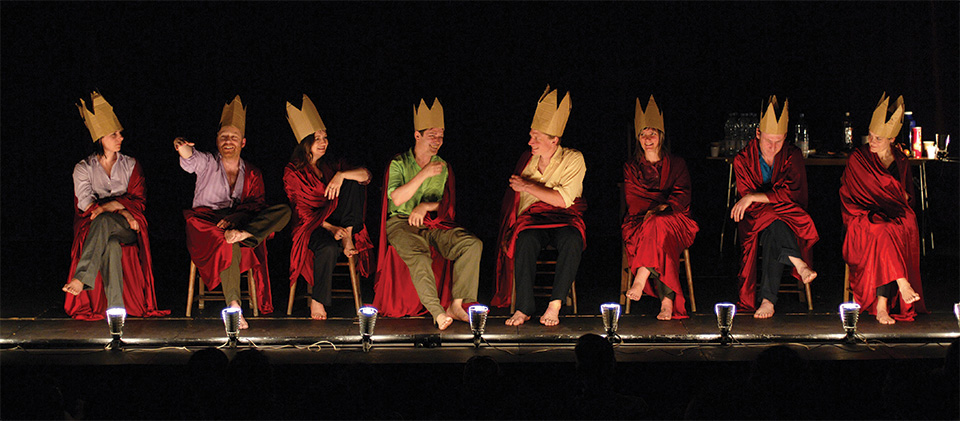 Members of the Sheffield, UK–based performance company Forced Entertainment on stage in And on the Thousandth Night at the Hebbel am Ufer performance center in Berlin. Photo: Hugo Glendinning