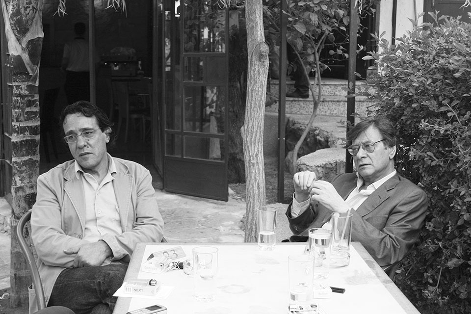 Ghassan Zaqtan (left) and Mahmoud Darwish in a 2007 photo taken by Palestinian poet Bashir Shalash.