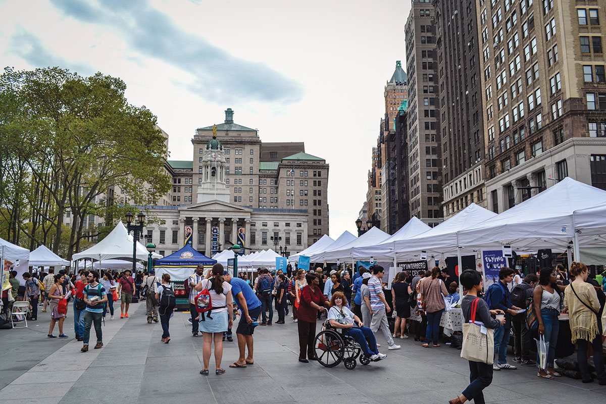The vendor booths line up in downtown Brooklyn, right in  front of Brooklyn Borough Hall.