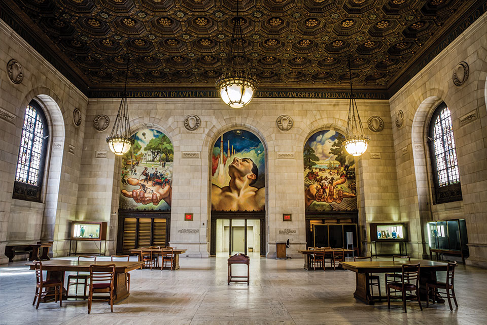 A triptych mural by local artist John Stephens Coppin graces the third floor of the Detroit Public Library.