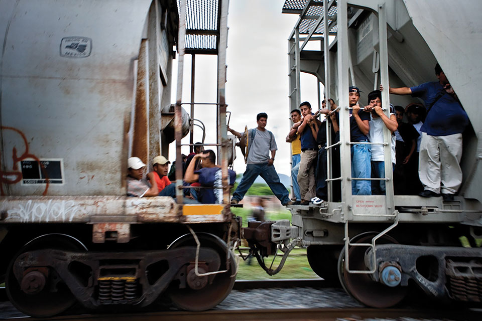 Migrants heading north through Mexico on La Bestia (“The Beast”). 