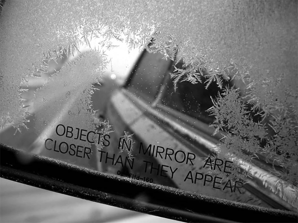 Ice crystals on a car mirror