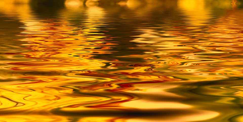 Light from a sunset reflected in water