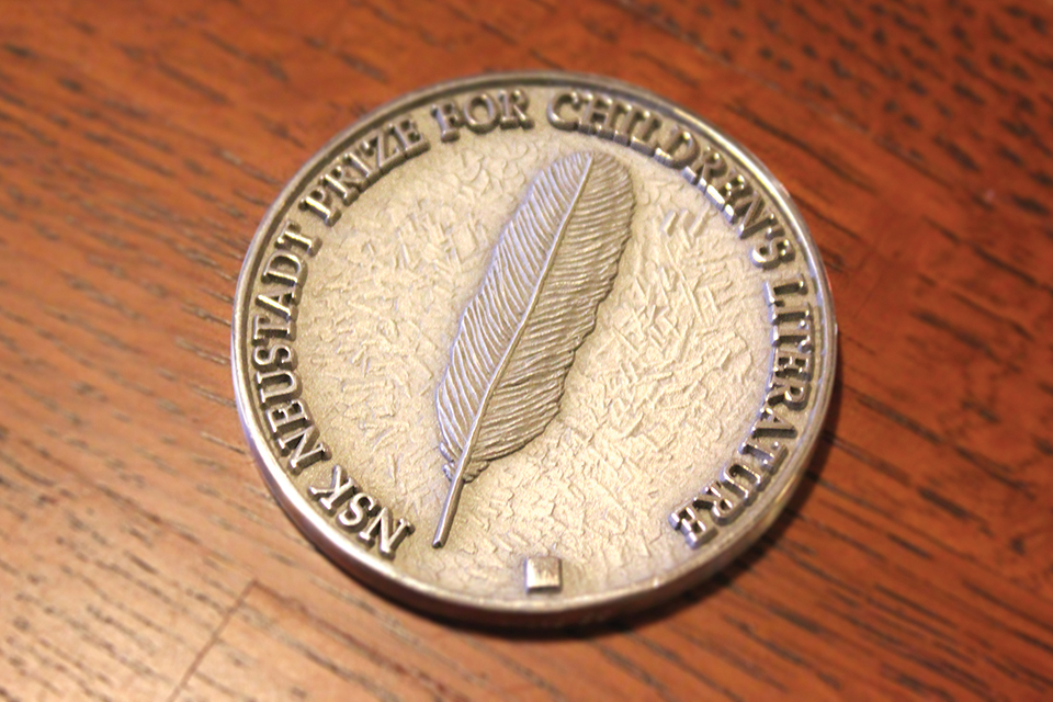 A photograph of the NSK Laureate's medallion