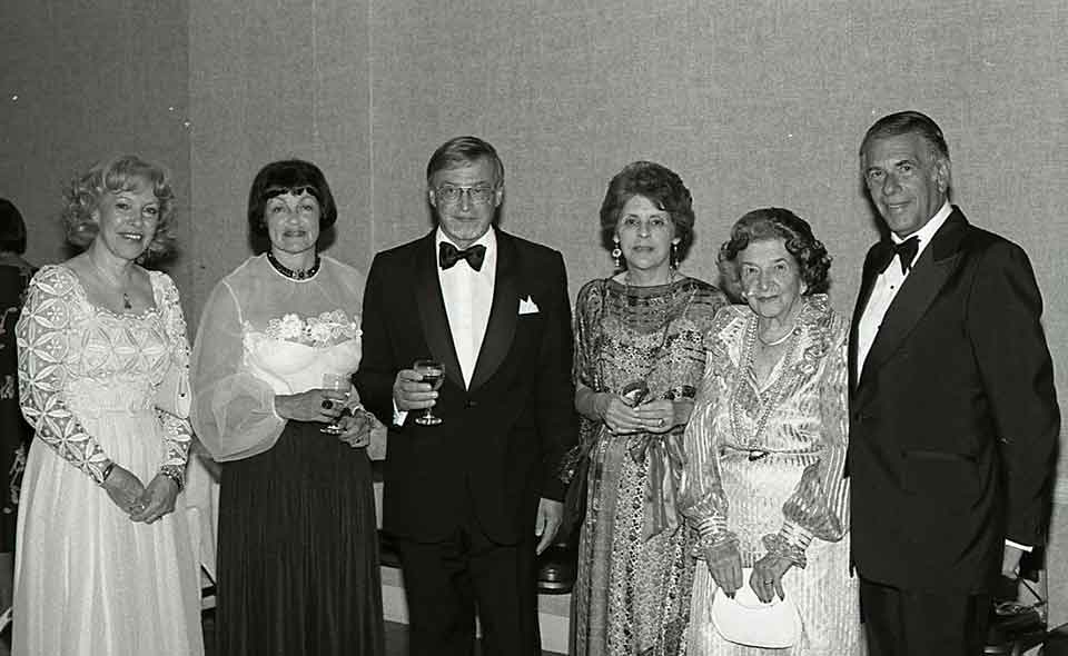 A photograph from the Neustadt Banquet in 1984. Left to right: Astrid Ivask, Ritva Rainio, Paavo Haavikko, Dolores Neustadt, Doris Westheimer Neustadt, and Walter Neustadt Jr.
