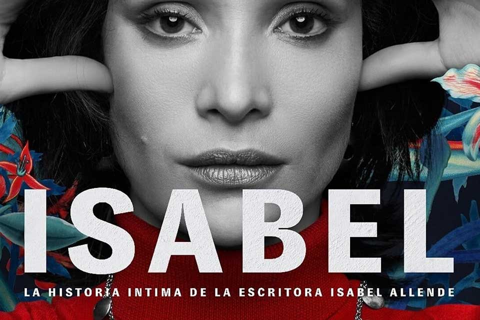 A closeup photograph of Isabel Allende. Text reads: Isabel. The intimate story of Isabel Allende