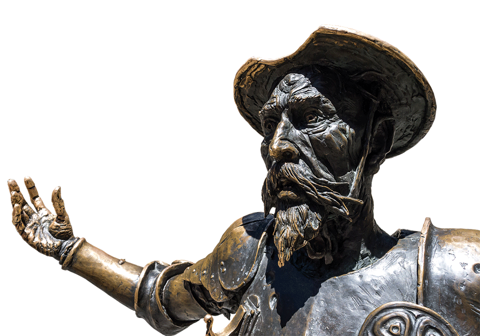 A photo of a metal statue of the character Don Quixote.