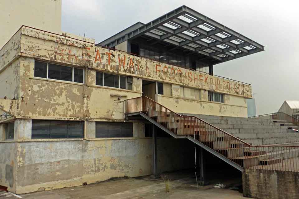 A photograph of a derelict factory