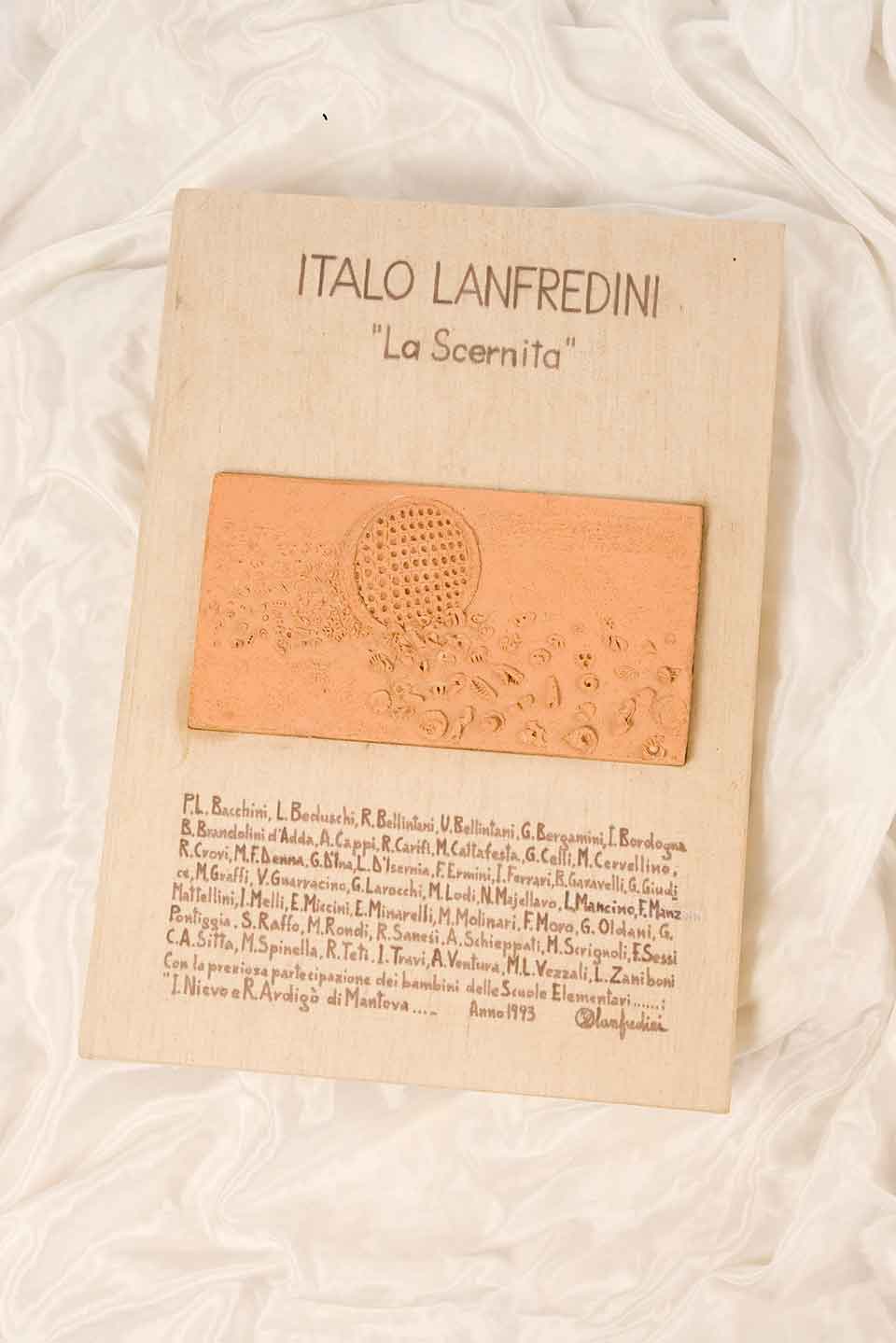 A photograph of a book's page. The text is in Italian