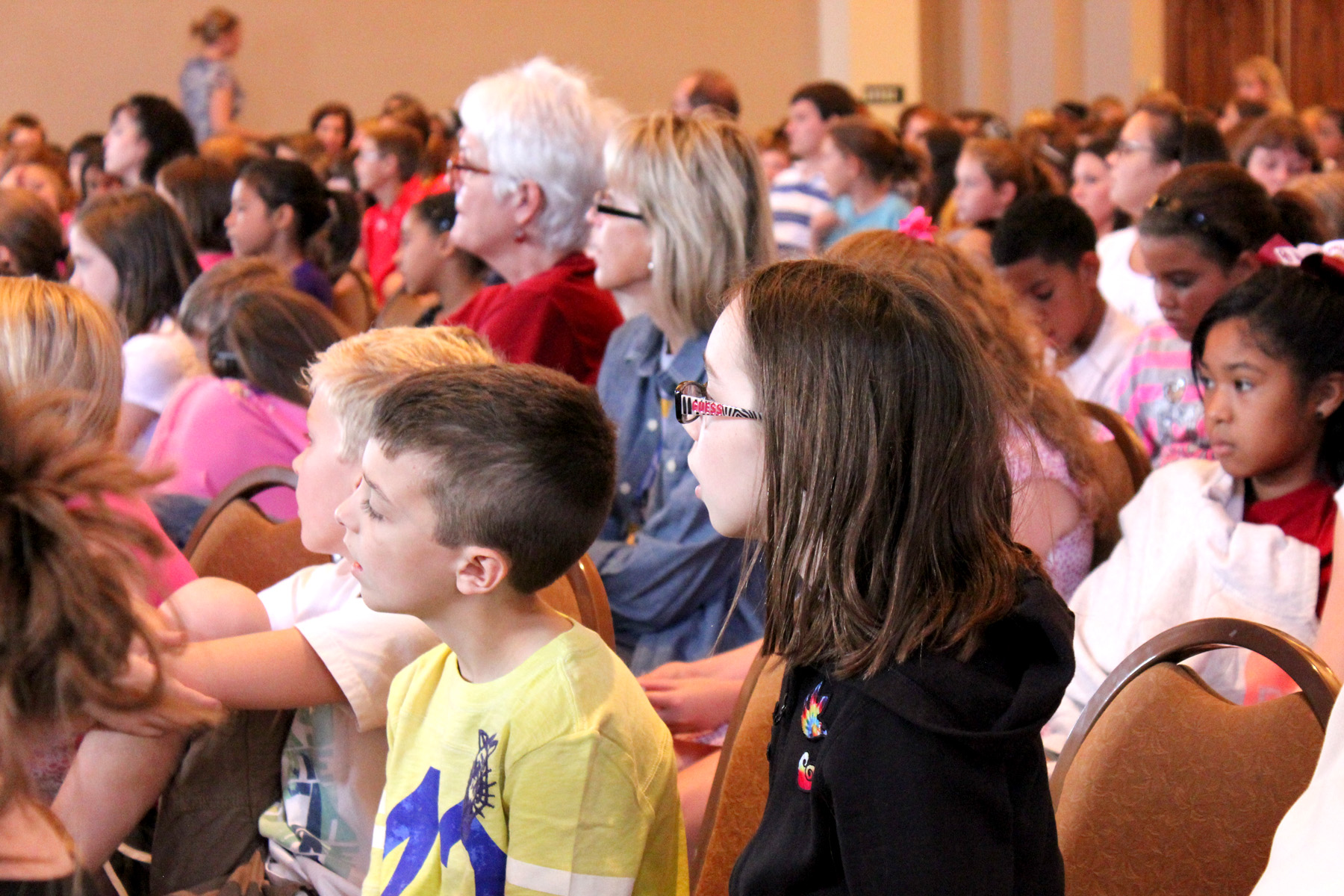 Norman Public School 4th and 5th graders look on at the beginning of the CultureQuest readings. Photo by Jen Rickard.