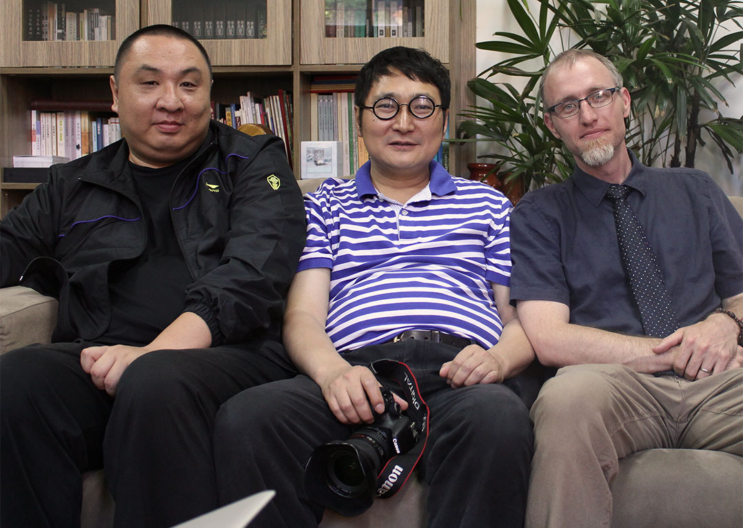 Animator Zhao Zhiwei (at left) with Li Sen and Jonathan Stalling.
