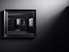 A shadowy black and white photograph of a mirror with windows reflected in it. Photo by Wilhelm Gunkel / Unsplash.