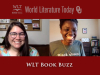 A snapshot of the third episode of Book Buzz with hosts Laura and Bunmi smiling
