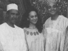 A grainy black and white photograph of Nuruddin Farah with his wife, Dr. Amina Mama, and Kwame Anthony Appiah