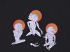 An illustration of three emaciated figures in a meditation posture with iconographic halos surrounding their heads, all against a black background