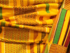 The traditional Ghanian kente cloth that Meshack Asare wore to the 2015 Neustadt Festival ceremony.