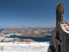 A stone structure overlooks the Aegean Sea off the coast of Patmos
