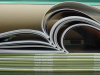 Stack of WLT magazines