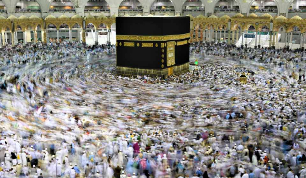 A photograph of a throng of people gathered for the Hajj