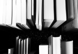 Overhead view of books in black and white