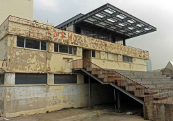 A photograph of a derelict factory