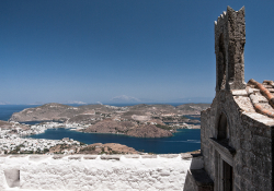 A stone structure overlooks the Aegean Sea off the coast of Patmos