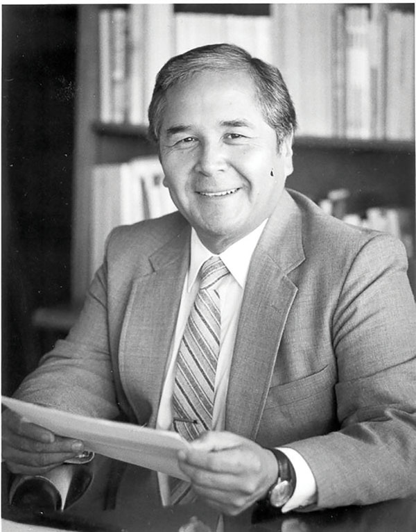 A black and white photograph of Dr. Tomás Rivera
