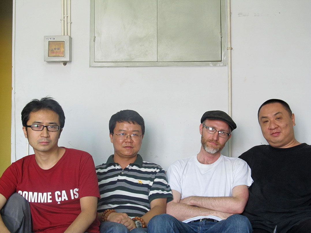 The team in summer 2012, near the end of the project (from left): artist Dongliang Wang, consultant Wang Hao, Jonathan Stalling, and animator Zhao Zhiwei. 