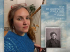 Julie Masis with the cover to her book How My Grandfather Stole a Shoe