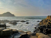Waves crash on a rocky shore