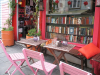 A bookshop with chairs and a table outside