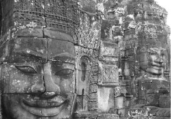 Stone faces in Cambodia. Photo by Tammy Ho.
