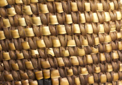 A close-up photograph of a woven basket