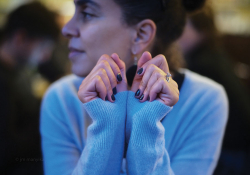 Sarah Ladipo Manyika sits, looking away from the camera, in a blue sweater